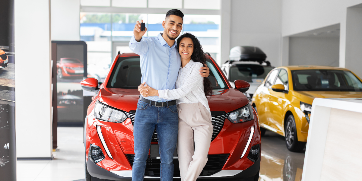 couple-with-new-car couple with new car